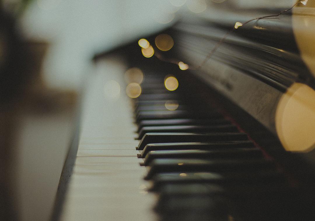 Close up of a piano keyboard.