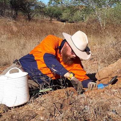Graduate archaeologist working in the field