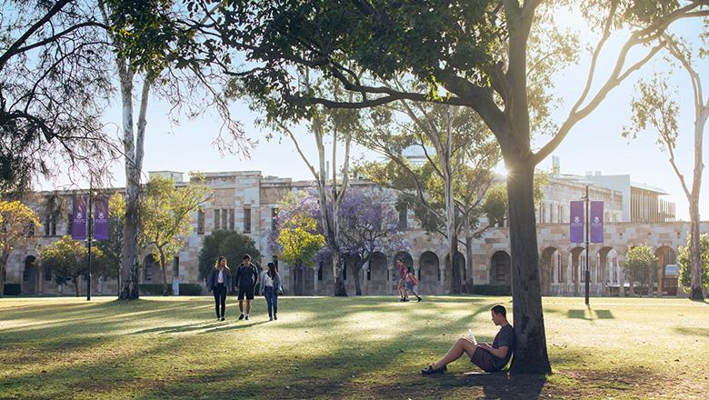 Students walking together in the Great Court at UQ's St Lucia campus